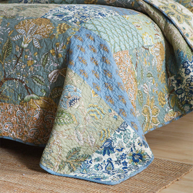 Enchanting Bohemian - Style Quilt Showcasing Intricate Floral Stitching, Complete with Matching Pillowcases