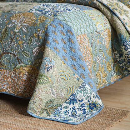 Enchanting Bohemian - Style Quilt Showcasing Intricate Floral Stitching, Complete with Matching Pillowcases