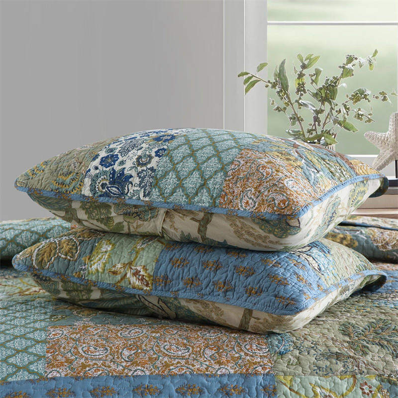 Enchanting Bohemian - Style Quilt Showcasing Intricate Floral Stitching, Complete with Matching Pillowcases